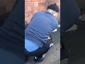 Bag snatcher tackled to the ground by passers-by after he pulled out a knife