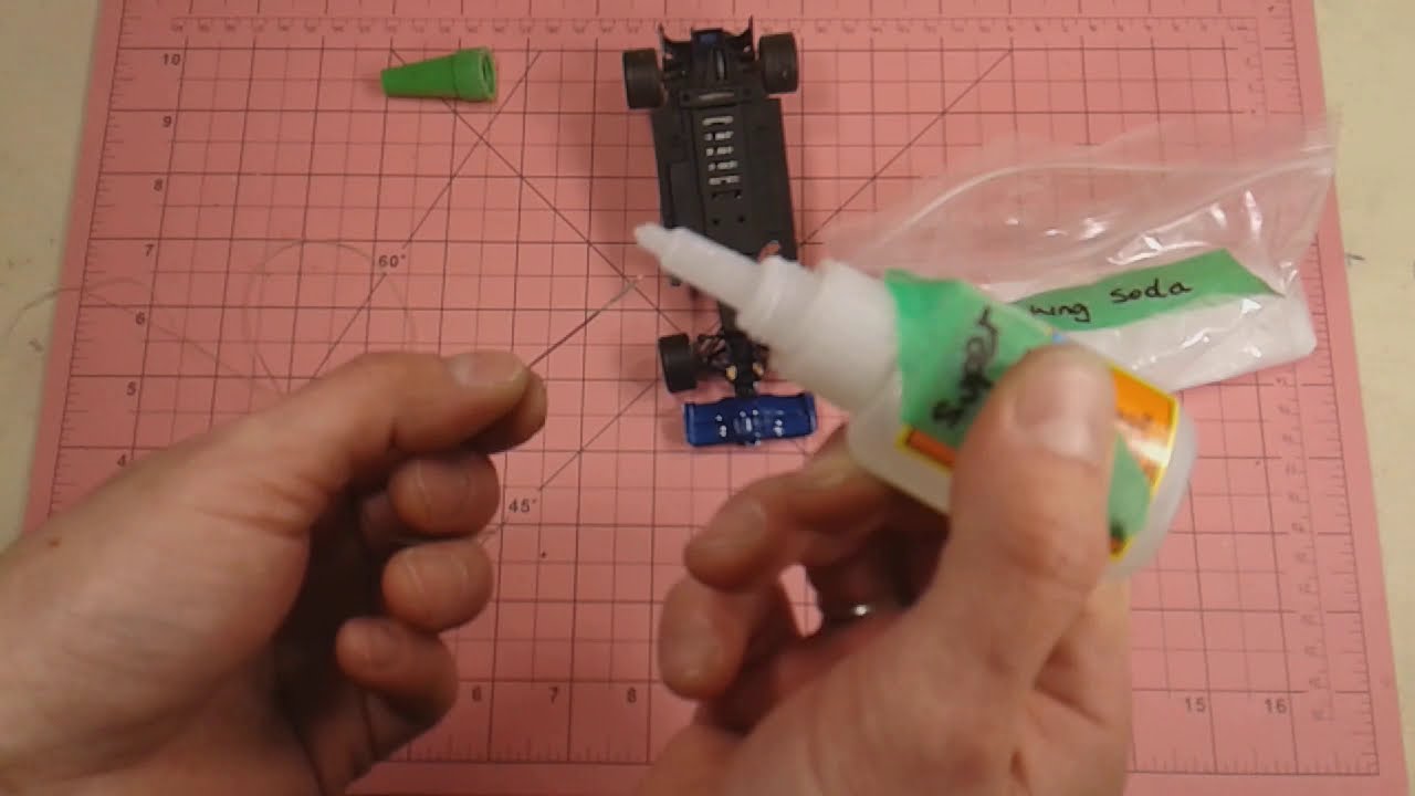 how to fix a slot car broken guide (scx f1 type)...sorry for saying baking powder every time