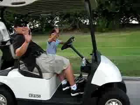 Isabella Driving Away in a Golf Cart - 8-2008