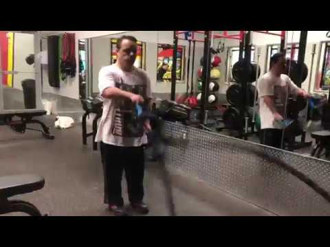 <p>Alex Rivera works with trainer JC Merino at Retro Fitness Hackensack.</p>