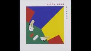Watch Elton John Love So Cold video