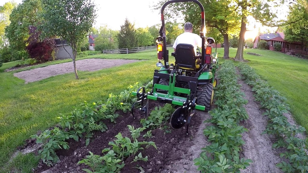 Compact Tractor Hilling Potatoes Finally