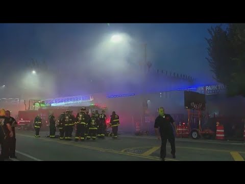 Firefighters battle Chinatown store fire in excessive heat - YouTube