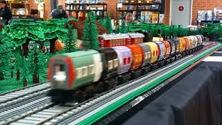 Lego Rainbow Train running in Byggepladen's Moduverse Layout, Klodsfest 2023