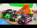 The boy plays in the kindergarten with toy cars. soccer balls! Police car pursuit of a sports car
