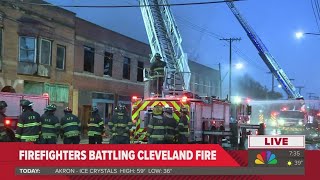 Crews battle fire at building in Cleveland