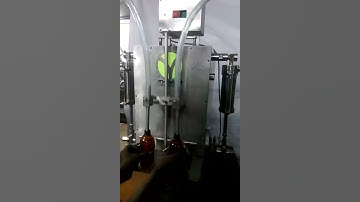 Semi Automatic Two Heads Liquid Filling Machine By Thiyya Technologies Inc., Ahmedabad