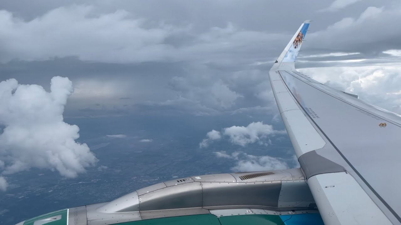 Frontier Airlines A320-NEO descent, landing, and gate arrival in Orlando ( MCO )