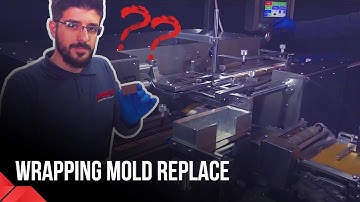 Learn how-to replace molds in chocolate wrapping machines