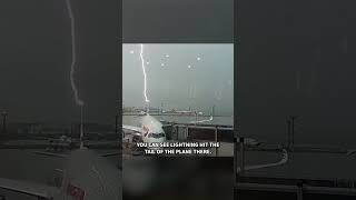 Cellphone video captured the moment lightning struck the tail of a British Airways plane