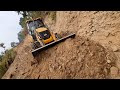 Satisfyingly Leveling Lots of Dirt and Stones on New Hilly Road with Jcb Backhoe