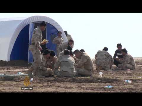 Sunni fighters train to retake Mosul from ISIL