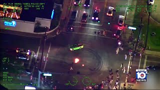 Crowd in Florida starts fire in an intersection