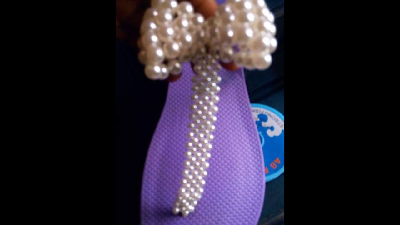 the tutorial on how to make this purple and white slippers beads YouTube