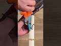 1 screw + 2 cable ties = a high-altitude fruit picking tool