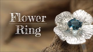 Creating a silver flower ring.