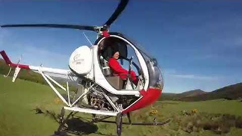 Hand held breakaway net gun captures deer from helicopter