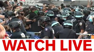 Protests outside NYC City Hall, clashes with police