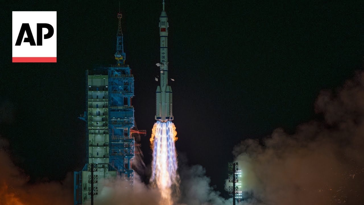 China launches new crew to its orbiting space station - YouTube