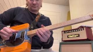 Test play with a new 4-string Lunchbox guitar
