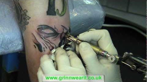 Grin N Wear It - 20 Minute Tattoo