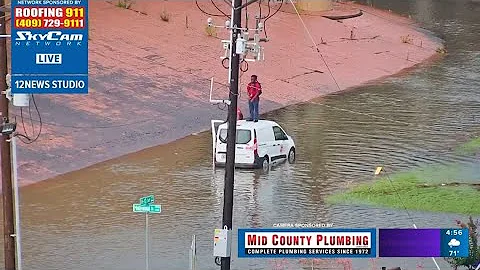 12News Skycam captures moment people are rescued after their car stalls out in water