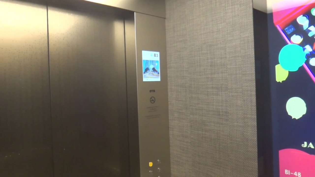 Raffles City Shopping Centre, Singapore - Otis Elevonic R Traction Elevator (Lobby B, Modernized)