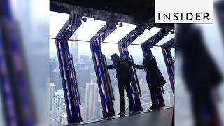 The John Hancock Center has windows that tilt