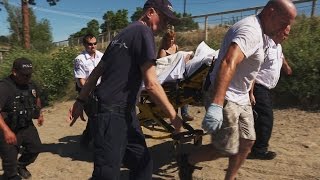 Fish and Wildlife Officers Work with EMTs to Rescue a Suspect