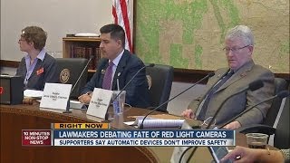 Lawmakers debate fate of red-light cameras