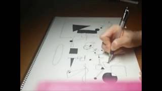 スケッチブックにペンで図形を描く