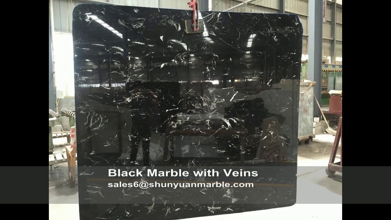Black marble slab with veins