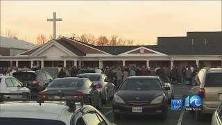 Dooley family and friends attend candlelight vigil