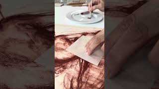 Our Paper Conservator Applies Pastel To An Area of Scratches