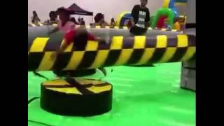 Kid Gets Hit By Spinning Thing