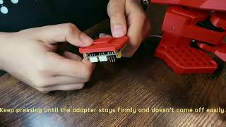 Attach the servo bus adapter to the mounting plate on SO-ARM100/101