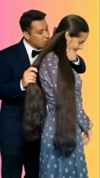 long hair lady having hair play with her boyfriend