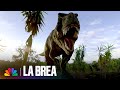 T-Rex Chases Scott, Ty and Paara | La Brea | NBC