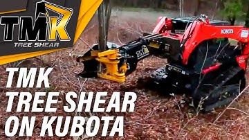TMK Tree Shear on a Kubota skid steer