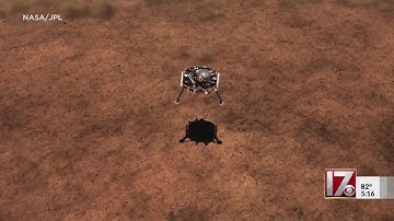 Mars lander picks up what