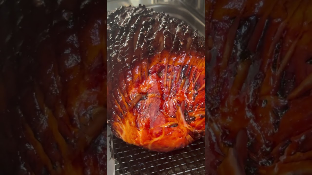 Ham roasting with orange glaze