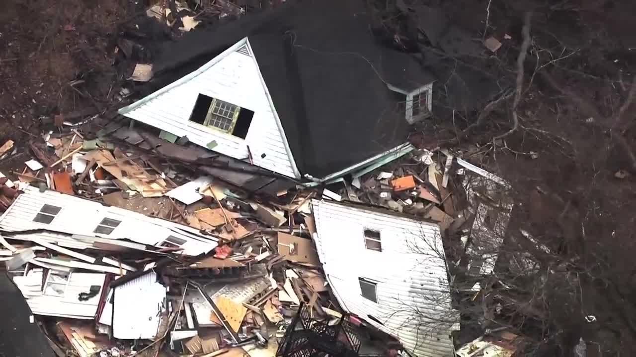 House in Perry North falls over due to landslide