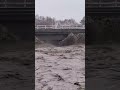 Kowhai River lashes bridge after breaching its banks| RNZ