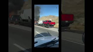 Car on fire on 15 freeway