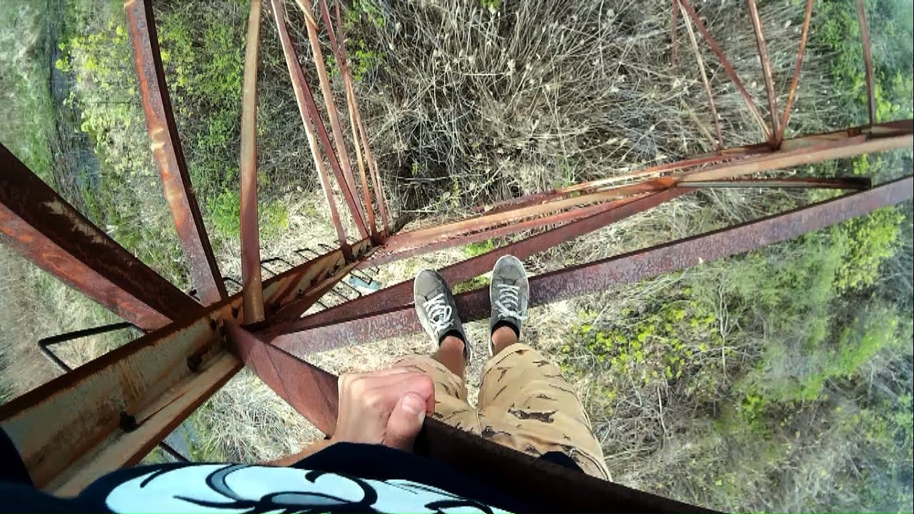 CLIMBING AN ELECTRICAL TOWER STOPPED BY POLICE