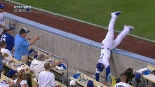 Crawford makes grab, falls into stands