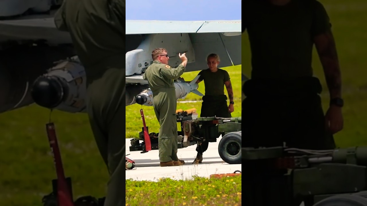 224th Fighter Squadron loads weapons onto an F/A-18 Hornet aircraft