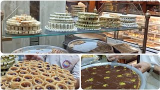 من عاصمة الحلويات في مصر (  أسرار الحلويات من أكبر محلات الحلويات الشرقية في دمياط/ شريف الزينى)