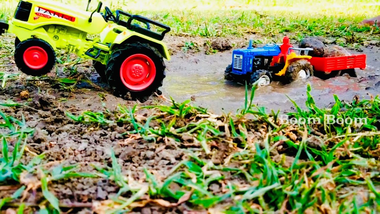 Tractor hmt stuck with heavy mud rescue by farm tractor Toy tractor power boomboom YouTube