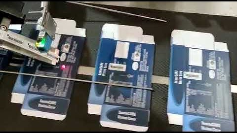 sticker applicator with feeder conveyor machine